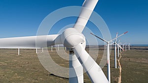 Close up wind turbine. Windmill for electric power production. Green energy.  Renewable energy