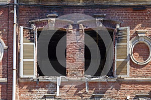 Red brick townhouse ravaged by the flames