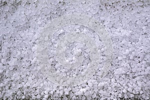 Close-up of window-sill after hailstorm