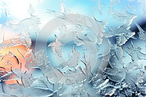 A close up of a window with water drops, frost and snow figures on an icy window in winter