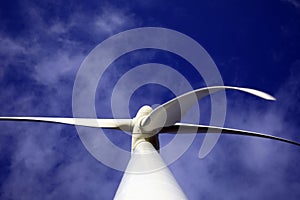 A windturbine and a blue sky photo