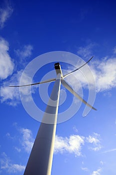 A windturbine and a blue sky photo