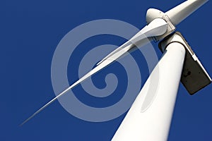 A windturbine and a blue sky photo