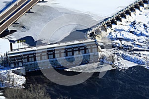 Close up winter aerial hydroelectric dam