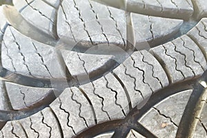 Close-up winter tire tread. Textured tire tread.