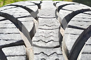 Close-up winter tire tread. Textured tire tread.