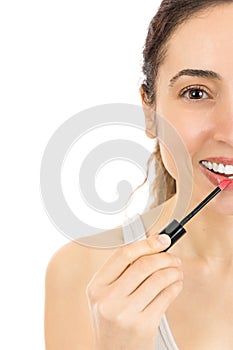 Close up of woman applying lipstick