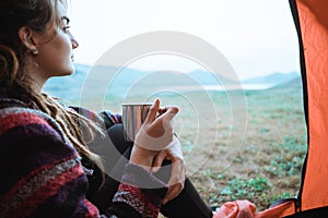 Close up a woman drink a cup of coffee after wake up