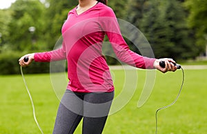Close up of woman exercising with jump-rope