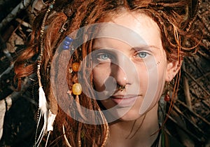 Close up Woman Face with Dreadlocks and Piercing