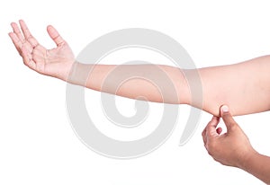 Close up woman with hand holding excessive arm fat isolated on w