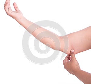 Close up woman with hand holding excessive arm fat isolated on w