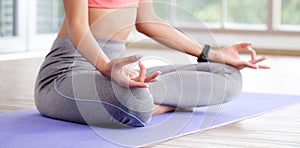 Close up of woman hand practice yoga meditation exercise at home with copy space, Yoga posture banner