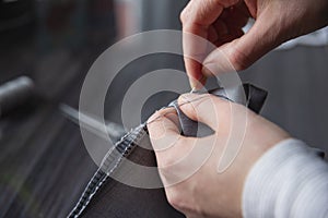 Close up of woman hand sewing