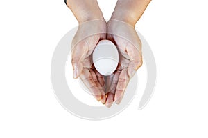 Close up of an woman hands, holding fresh duck egg