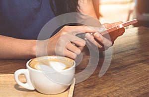 Close up of  woman hands holding touching mobile phone with blank copy space for your text message