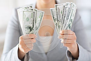 Close up of woman hands holding us dollar money