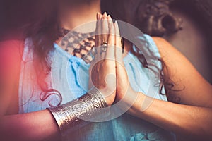 Close up of woman hands in namaste gesture