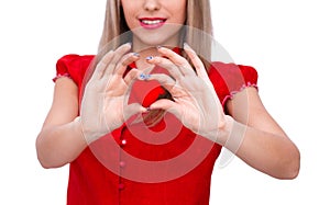 Close up of woman hands with red heart isolated on white