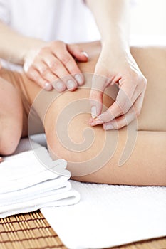 Close-up of a woman having acupuncture treatment