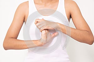 Close up woman holding her wrist symptomatic Office Syndrome on white background