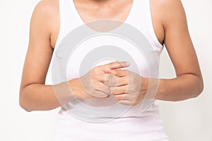 Close up woman holding her wrist symptomatic Office Syndrome on white background