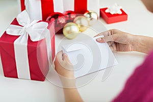Close up of woman with letter and presents