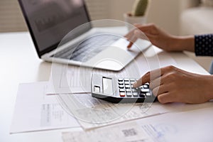 Close up of woman manage household finances