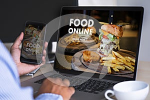 Close up woman ordering food online by internet Concept order photo