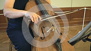 Close-up of a woman playing the contrabass