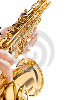 Close up woman playing saxophone isolated on white studio background