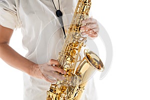 Close up woman playing saxophone  on white studio background