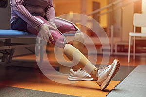 Close up of a woman with prosthetic legs