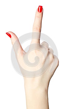 Close-up of woman`s hand with red nails pointing index finger on white background.