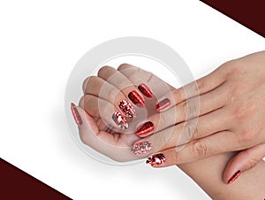 Close up of a woman's hands with a perfect professional red manicure