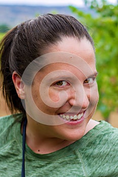 Close-up Woman with Sly Smile and Nosering