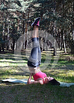 Close up of woman stretching legs