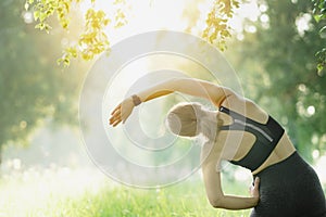 Close Up Of Woman Stretching Before Run