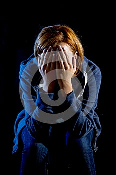 Close up woman suffering depression and stress crying alone