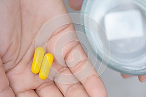 Close up of woman taking in pill, Medicine, health care