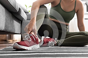 Close up woman is touching her pain of ankle after exercise. woman was injured while exercising