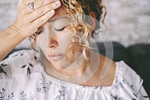 Close up of woman touching his front for head ache or stress disease. Healthcare and health medicine concept lifestyle. Headache.