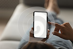 Close up of woman use smartphone with mockup screen