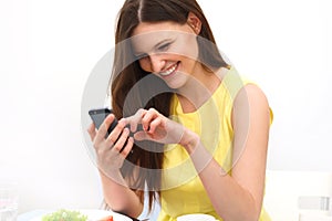 Close up of a woman using Mobile Smart Phone