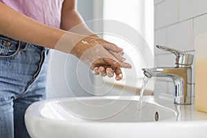 close up woman washing her hands. High quality photo