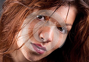 Close Up of Woman With Water Droplets on Face