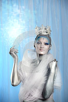 Close up of a woman wearing creative make up as Ice Queen