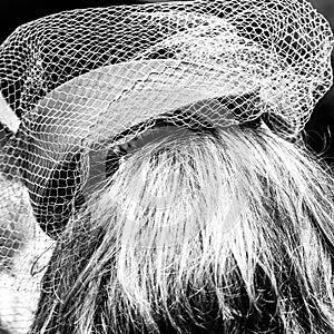 Close Up Of Woman Wearing Fashionable Hat Or Fascinator