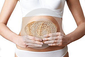 Close Up Of Woman Wearing Underwear Holding Slices Of Brown Bread