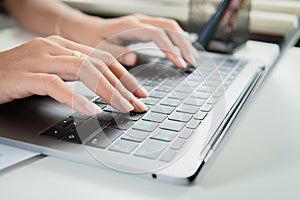 Close up woman working at home office